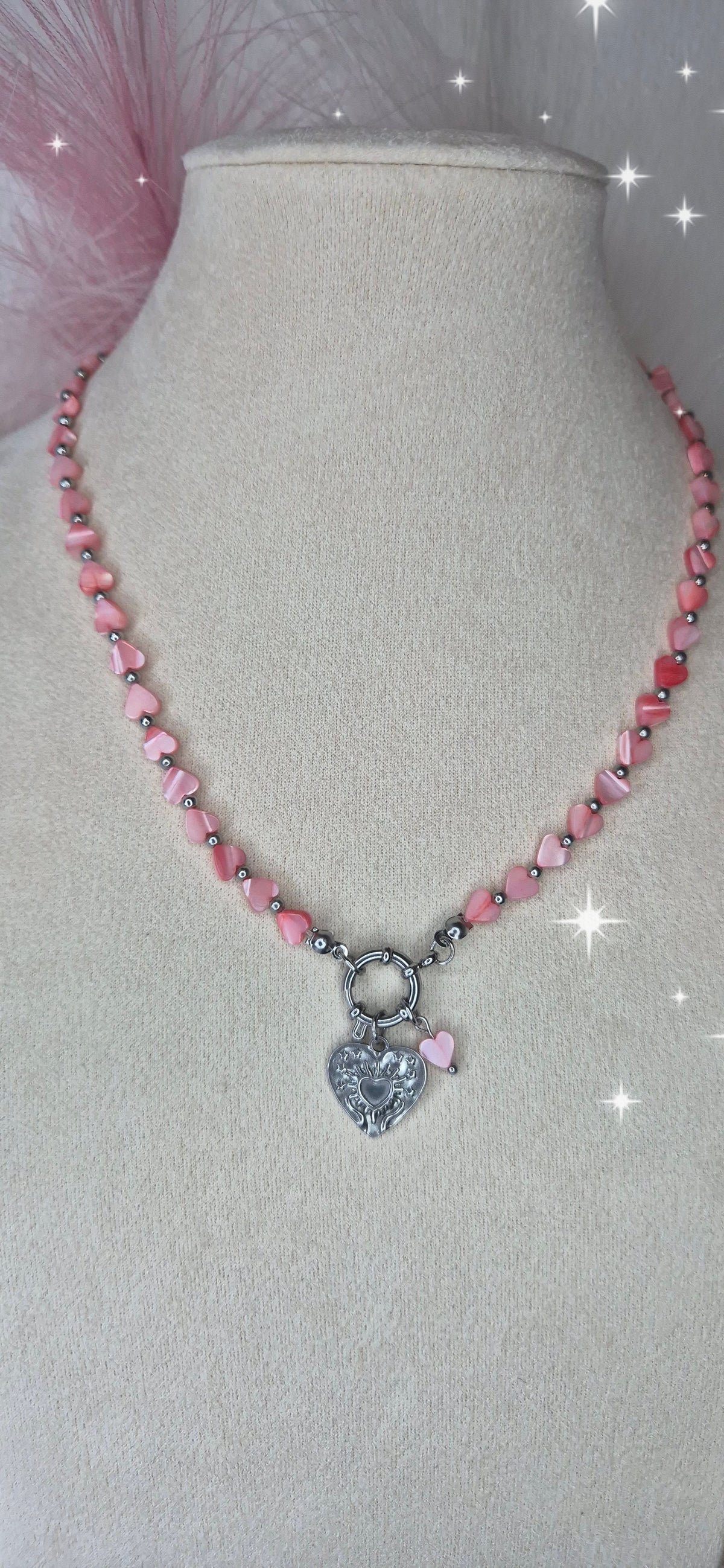 Collana Cuoricini in conchiglia madreperla chiusura timone e charm Cuore Sole Stelle acciaio silver