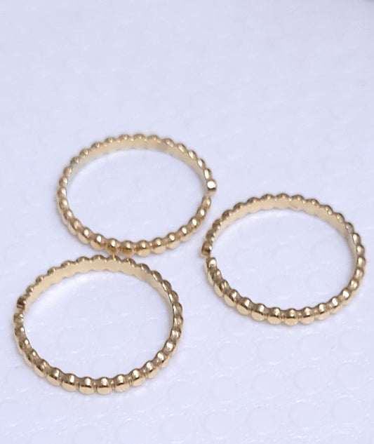 Anello a pallini tipo ferma-anello in acciaio dorè mis. regolabile