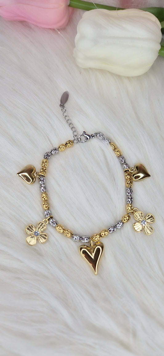 Nuovi bracciali tipo Dodo pepite in acciaio mix Silver & Gold con charms anche sonaglio e zirconi