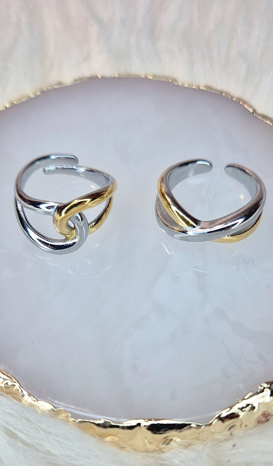 Anello Acciaio Bicolor Incrocio o Abbraccio mis. regolabile