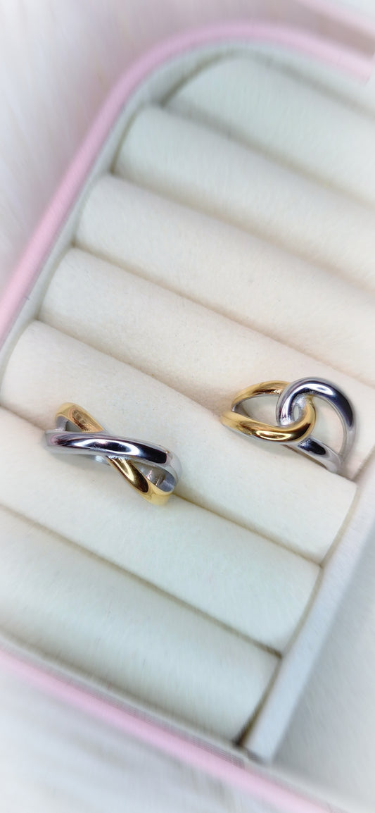 Anello Acciaio Bicolor Incrocio o Abbraccio mis. regolabile