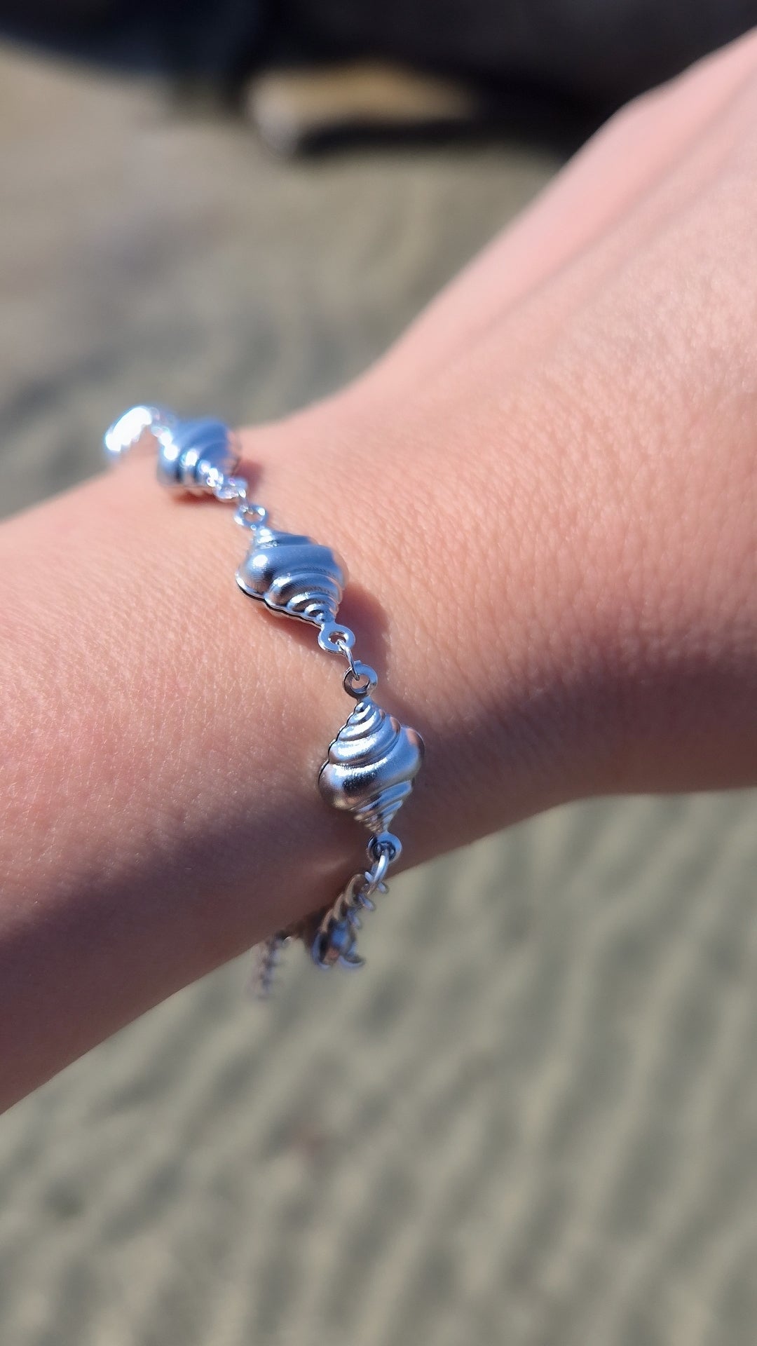 Bracciale conchiglia Paguro Estate 2026 *effetto sonaglio* in acciaio silver misura regolabile
