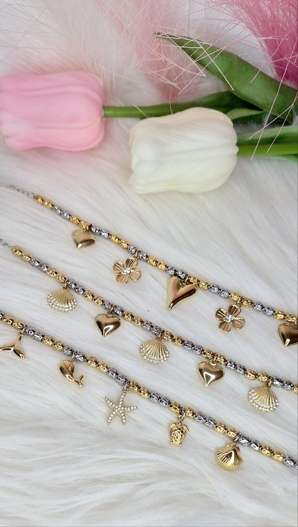 Nuovi bracciali tipo Dodo pepite in acciaio mix Silver & Gold con charms anche sonaglio e zirconi