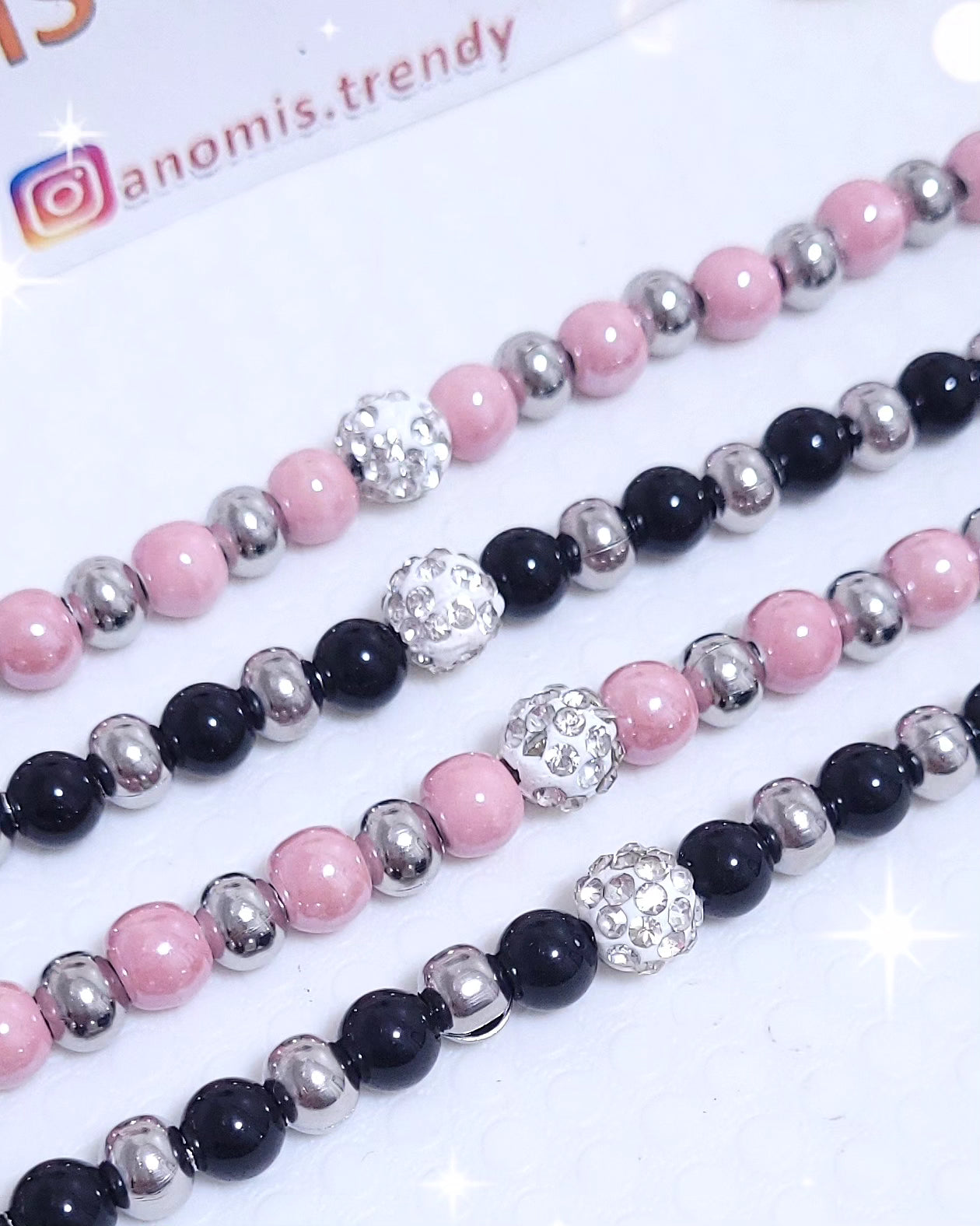 Bracciale regolabile sfere mix acciaio e Nere o Rosa con zirconi al centro