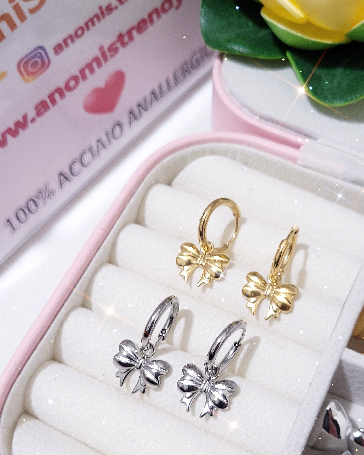 Orecchini cerchi mini-hoops in acciaio con Fiocco pendente