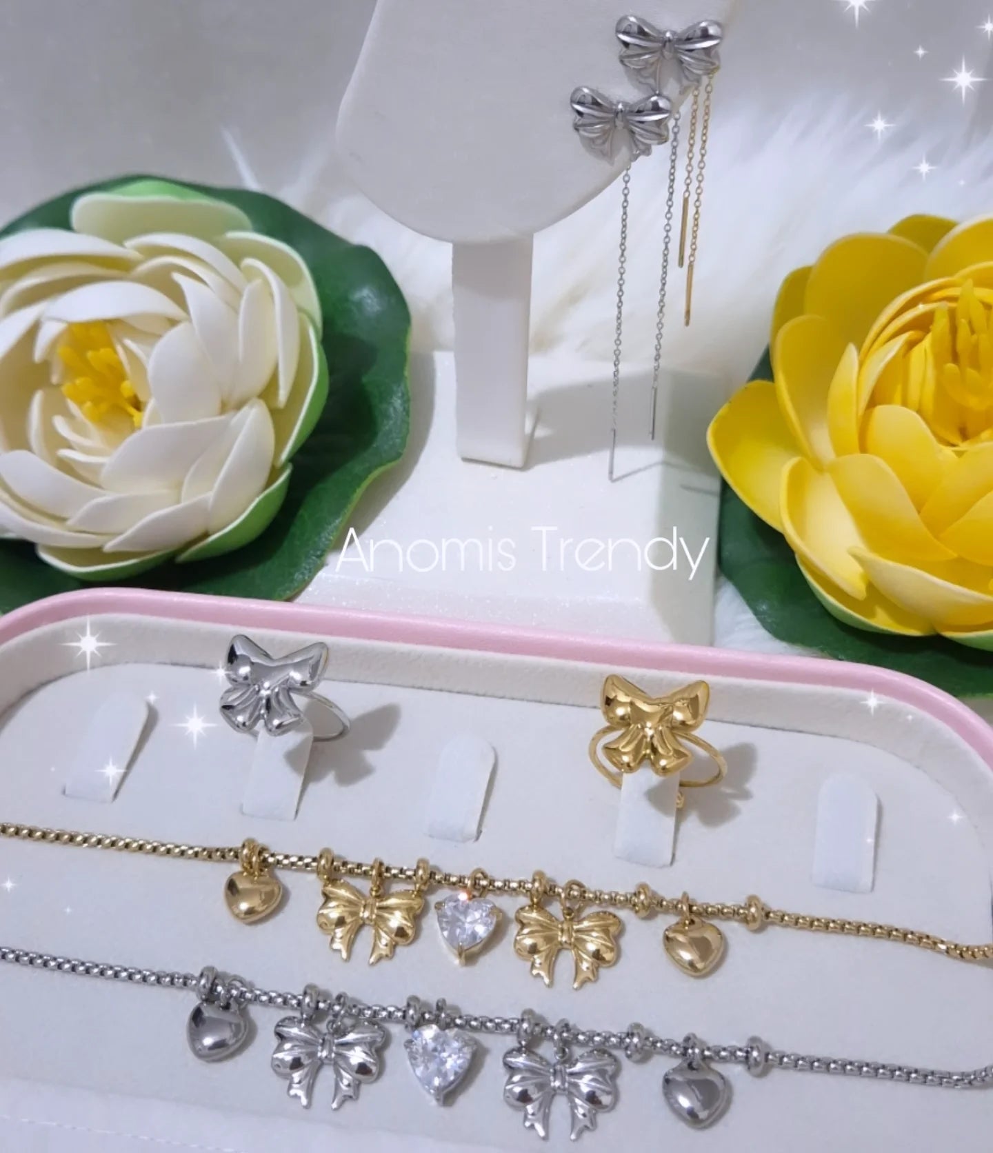 Linea Fiocchi 🎀 Orecchini sali-scendi, Anelli regolabili e Bracciali multicharms in acciaio anallergico