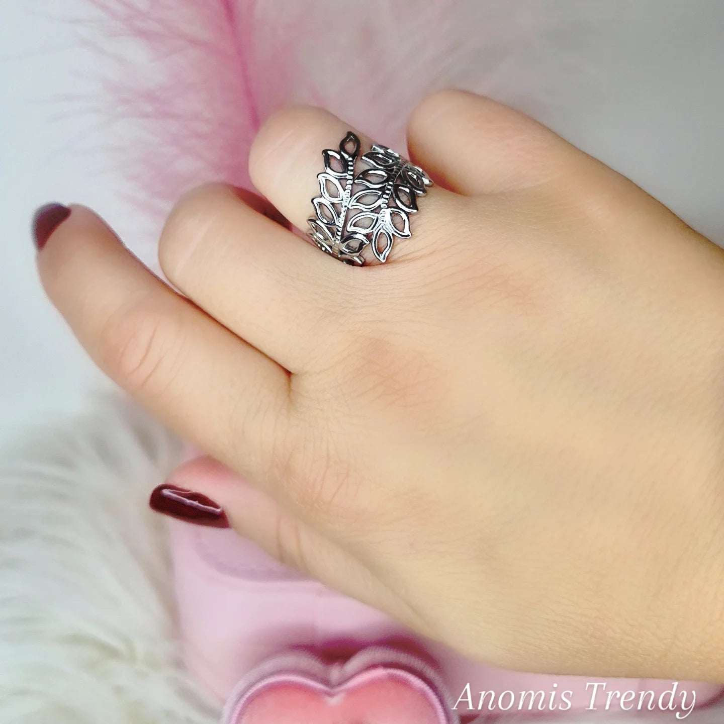 Anello doppio giro foglioline aperte 100% acciaio mis. regolabile