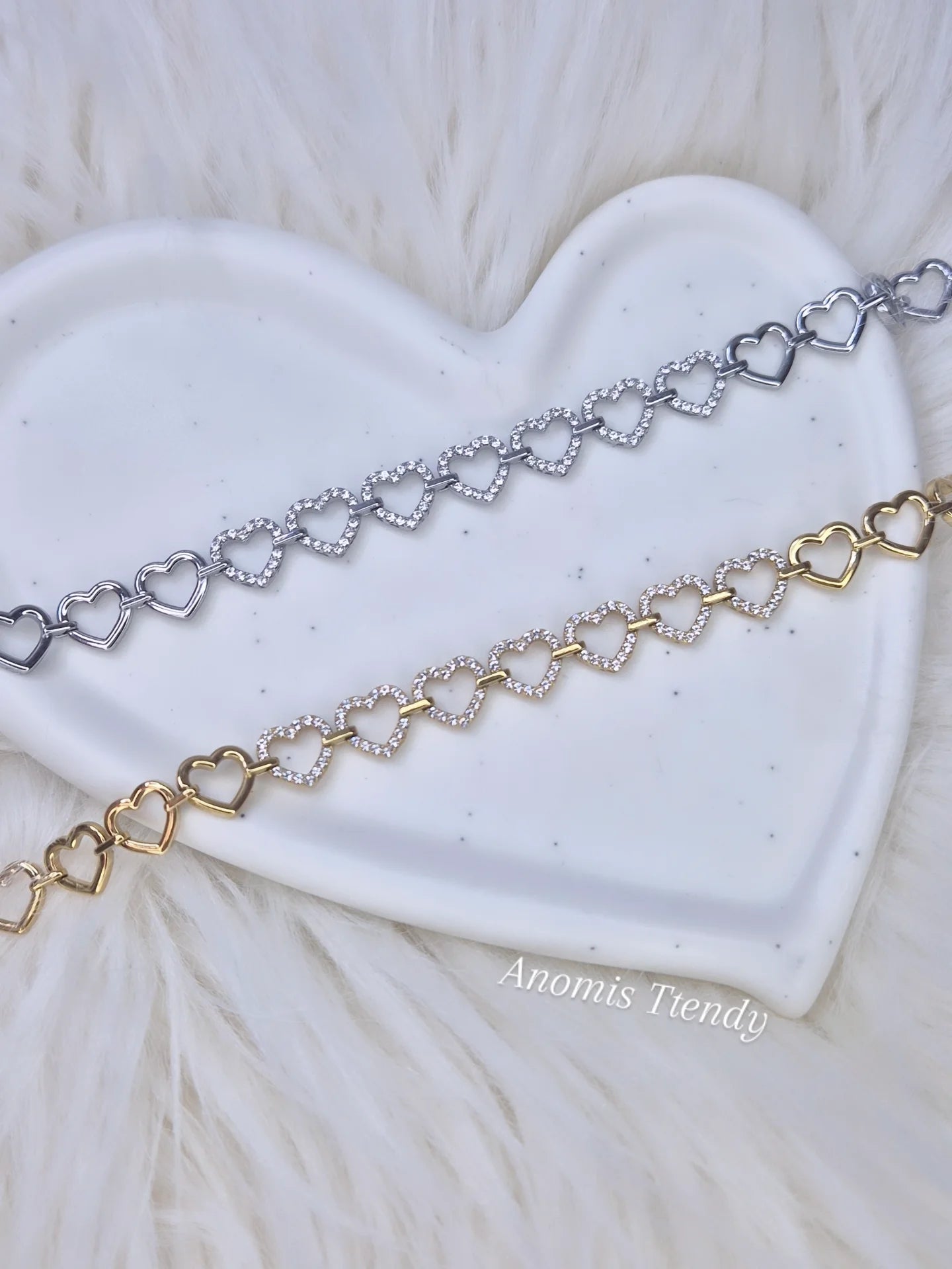 Bracciale Cuoricini abbracciati 100% acciaio con zirconi