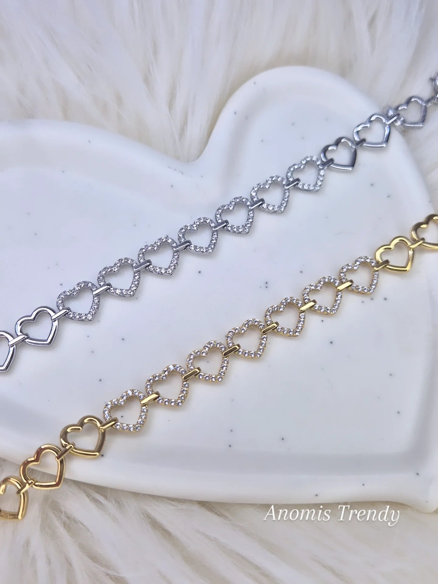 Bracciale Cuoricini abbracciati 100% acciaio con zirconi