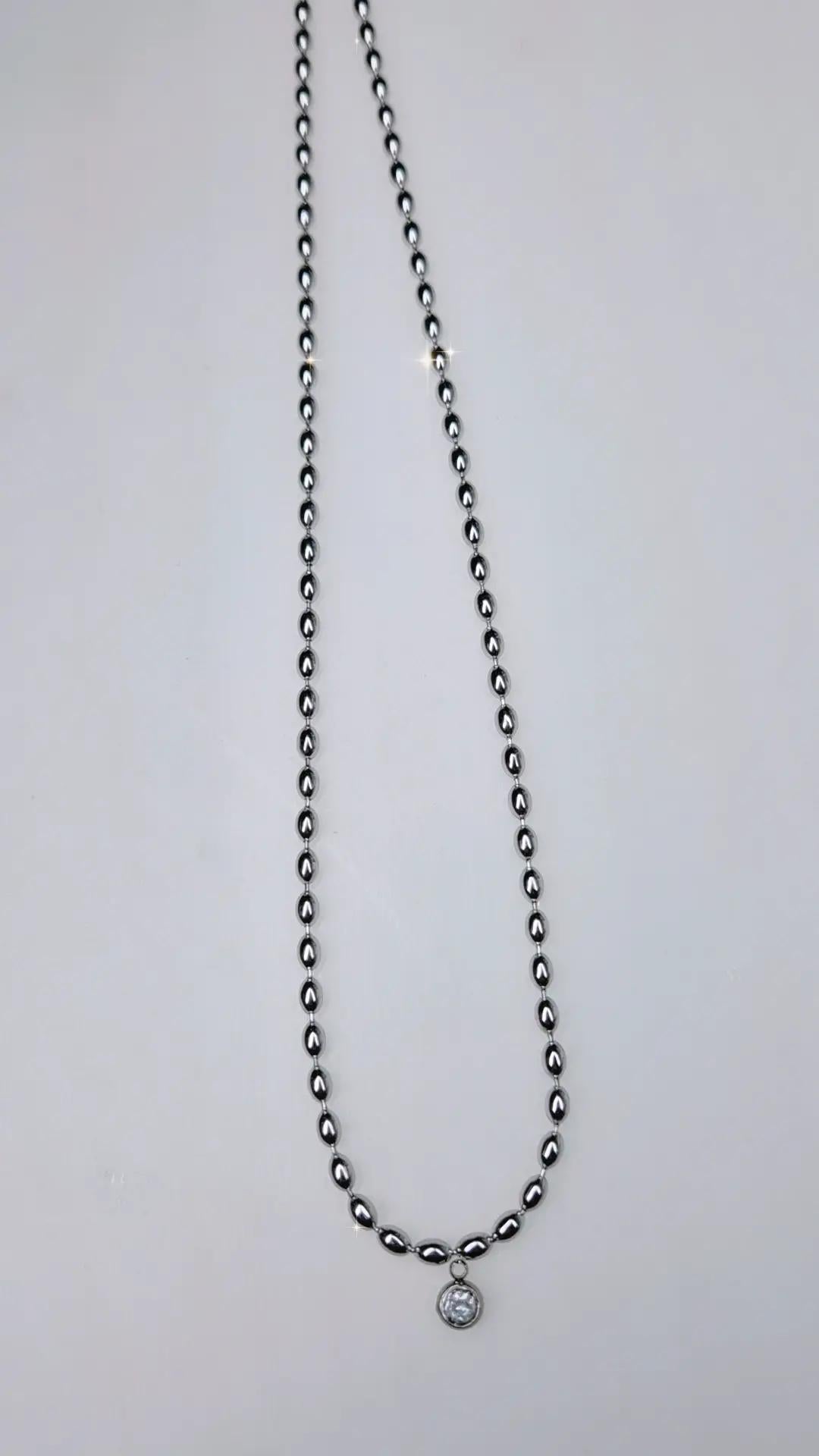 Collana maglia chicco di riso acciaio silver con punto luce crystal