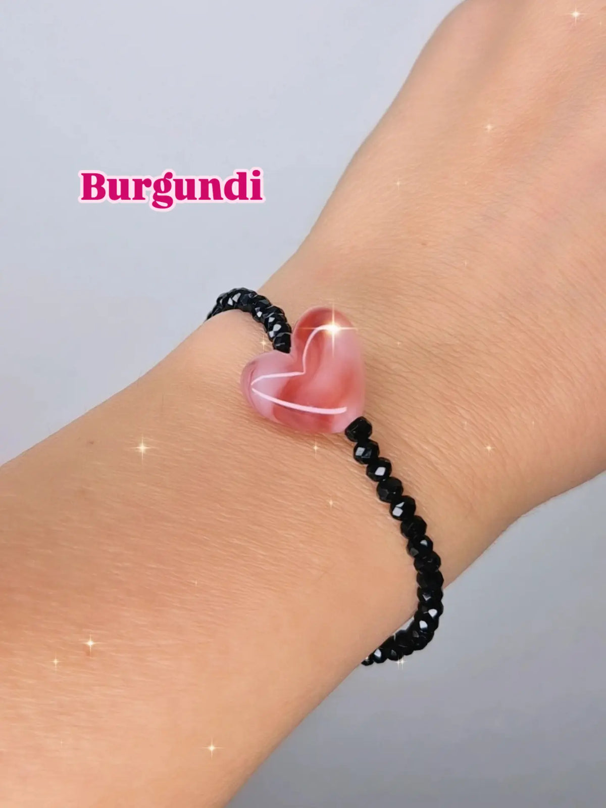 Bracciali elastici cristallini luminosi multisfaccettati neri con Cuore in resina effetto marmorizzato
