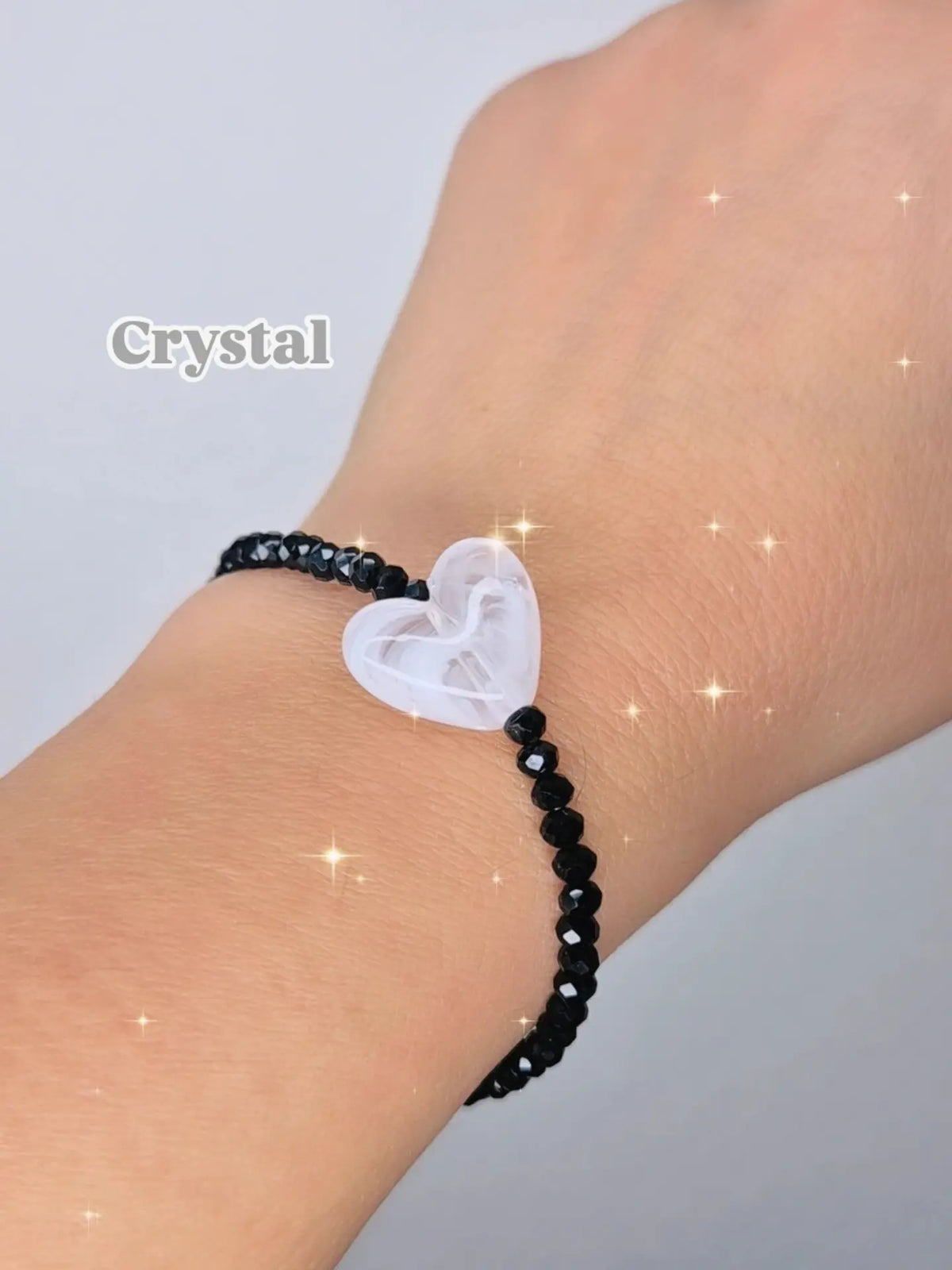 Bracciali elastici cristallini luminosi multisfaccettati neri con Cuore in resina effetto marmorizzato