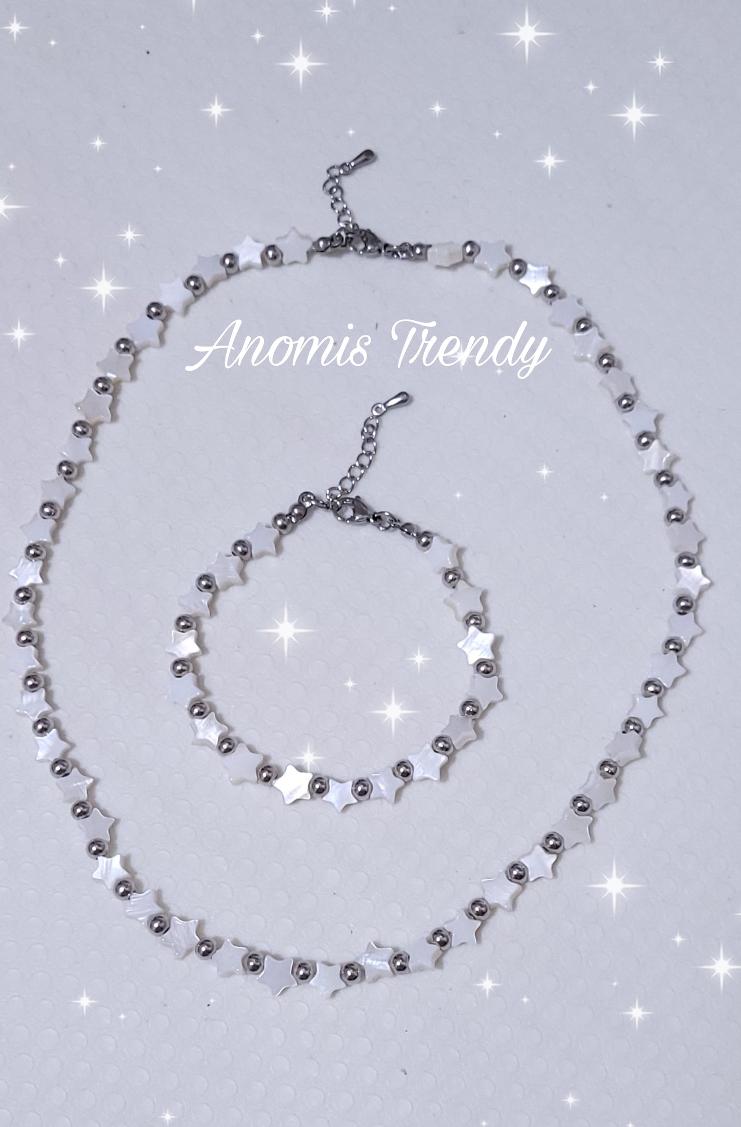 Collana Bracciale Stelline in conchiglia tipo madreperla e acciaio mis. regolab.