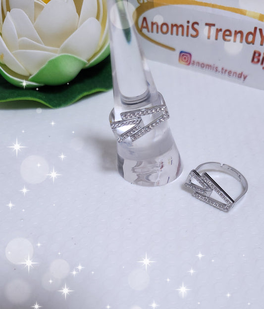 Anello V con zirconi in acciaio